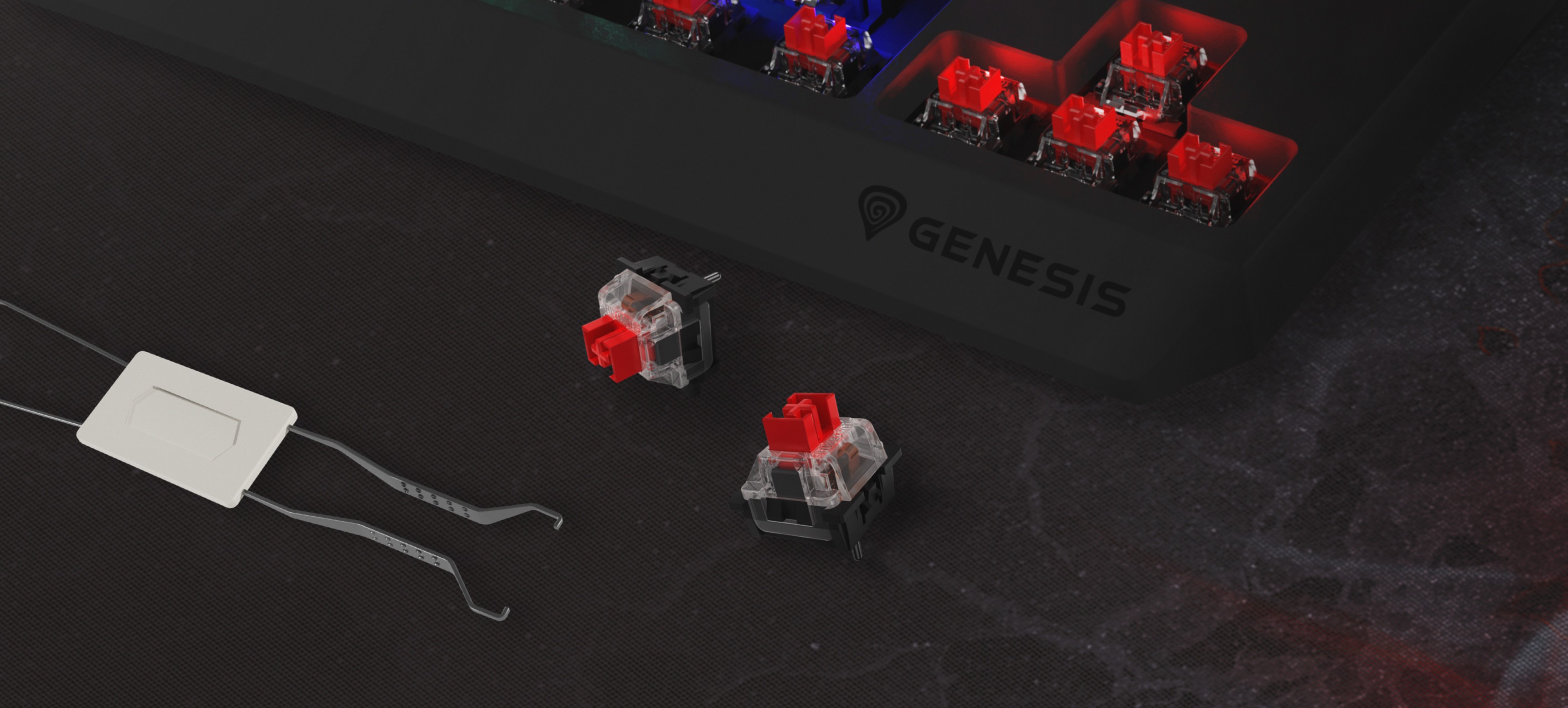 Ігрова клавіатура Genesis Thor 230 TKL Lite з червоними механічними перемикачами Outemu та інструментом для зняття перемикачів крупним планом